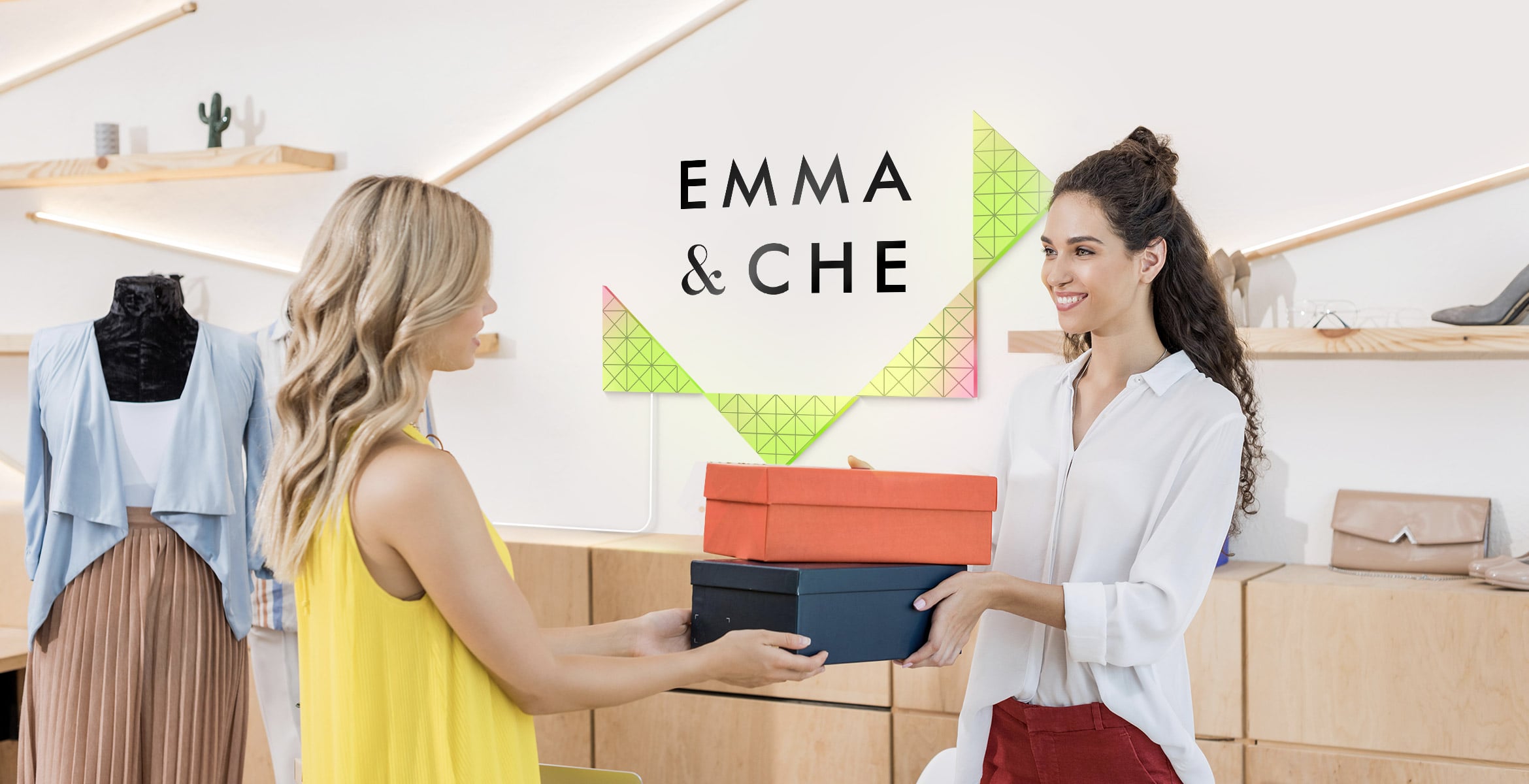 4 light surfaces, assembled into artistic shape, emphasize the brand logo of the clothing store and complement the interior