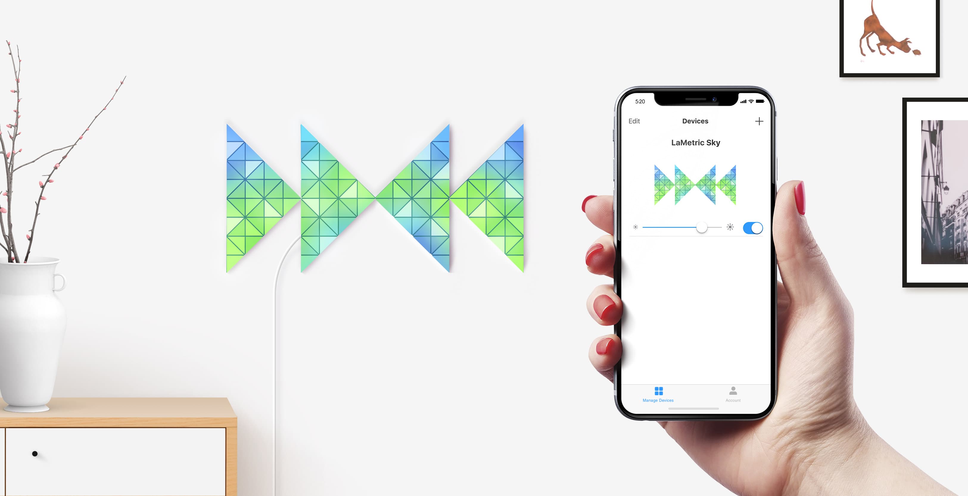 Bowtie shape, assembled from 4 smart light surfaces, complements room interior and iPhone shows ability to change brightness