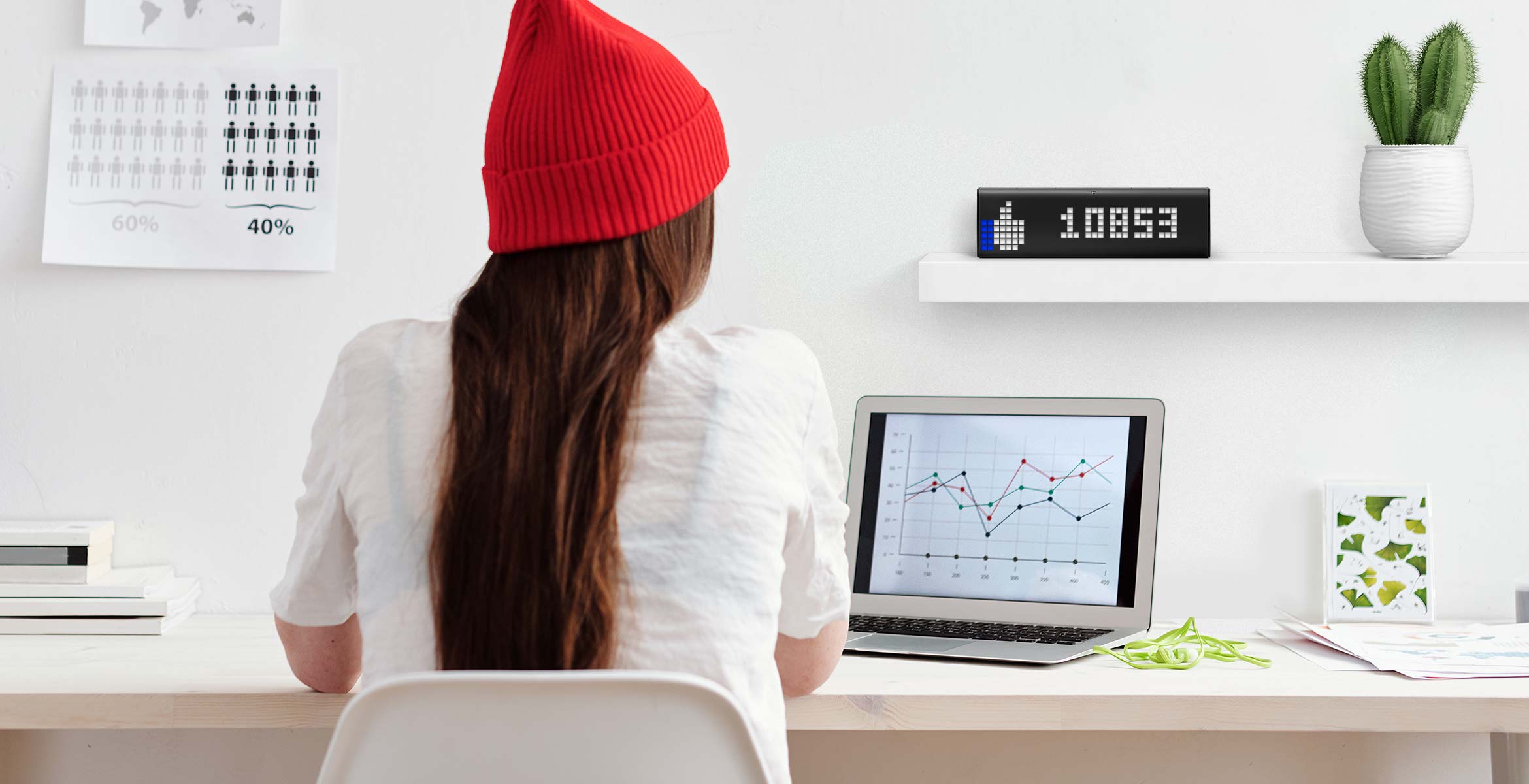 LaMetric Time smart clock complements the desk setup and displays Facebook like counter