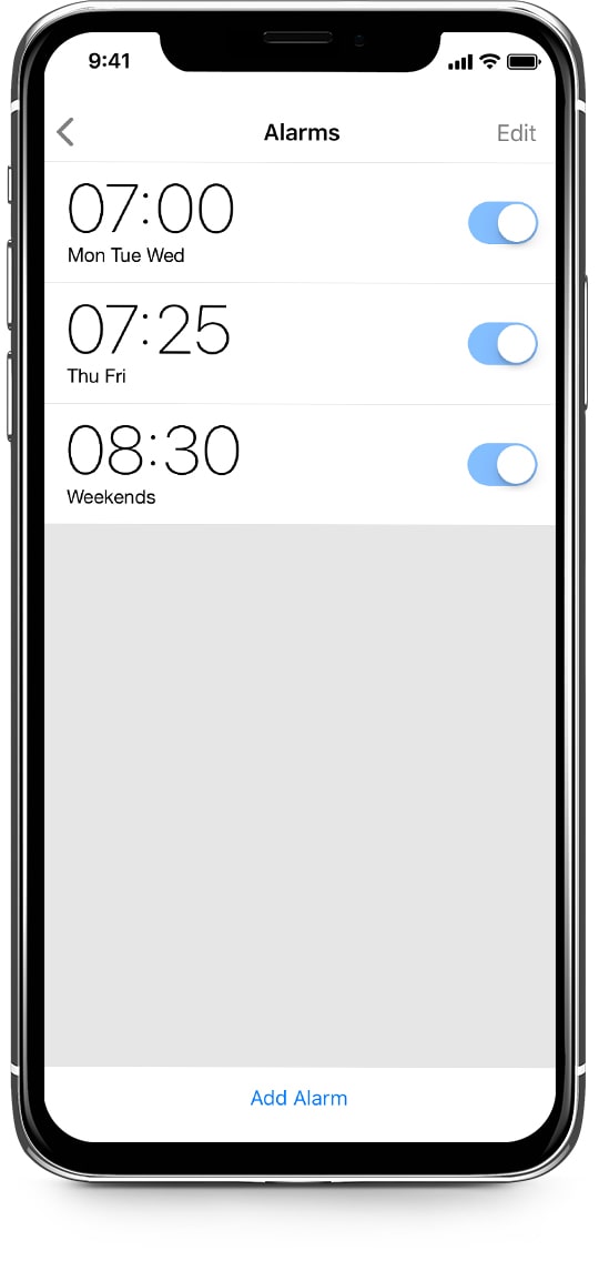 An iPhone shows alarms from LaMetric Time app for weekdays and weekend
