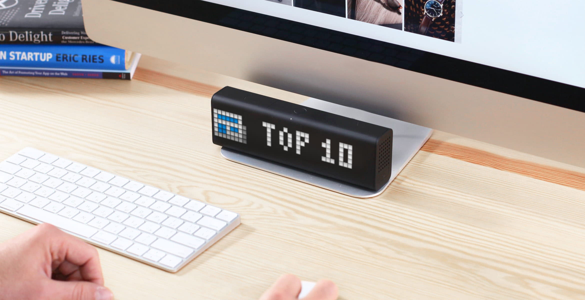 LaMetric Time digital clock complements the desk setup and displays the top-10 news