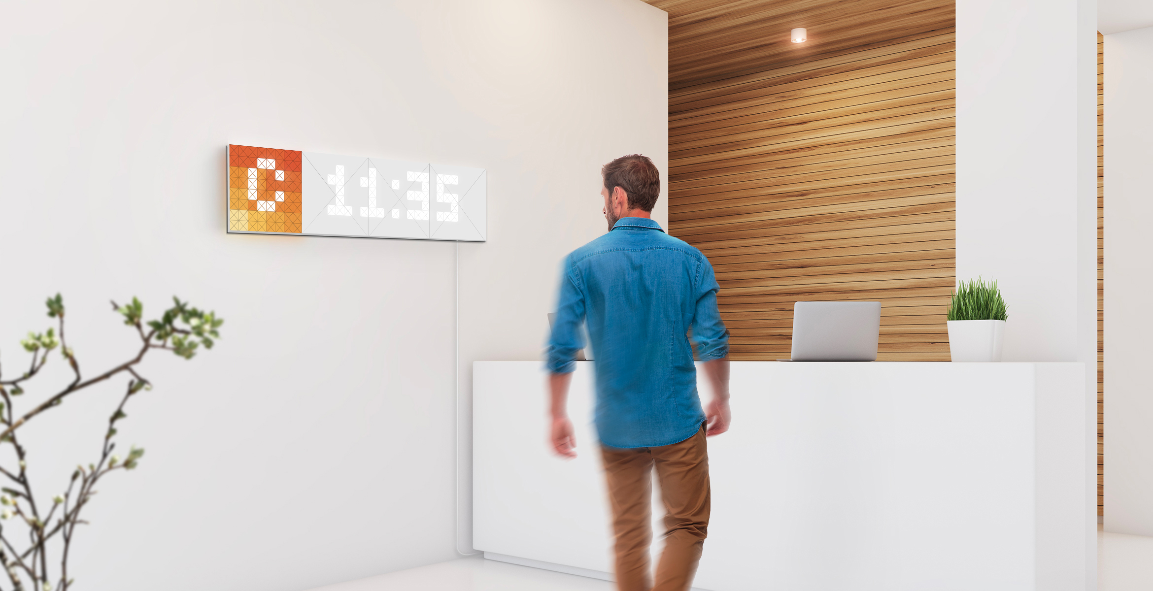 Infoscreen, assembled from 16 smart light surfaces, complements the office interior and displays time and company logo 