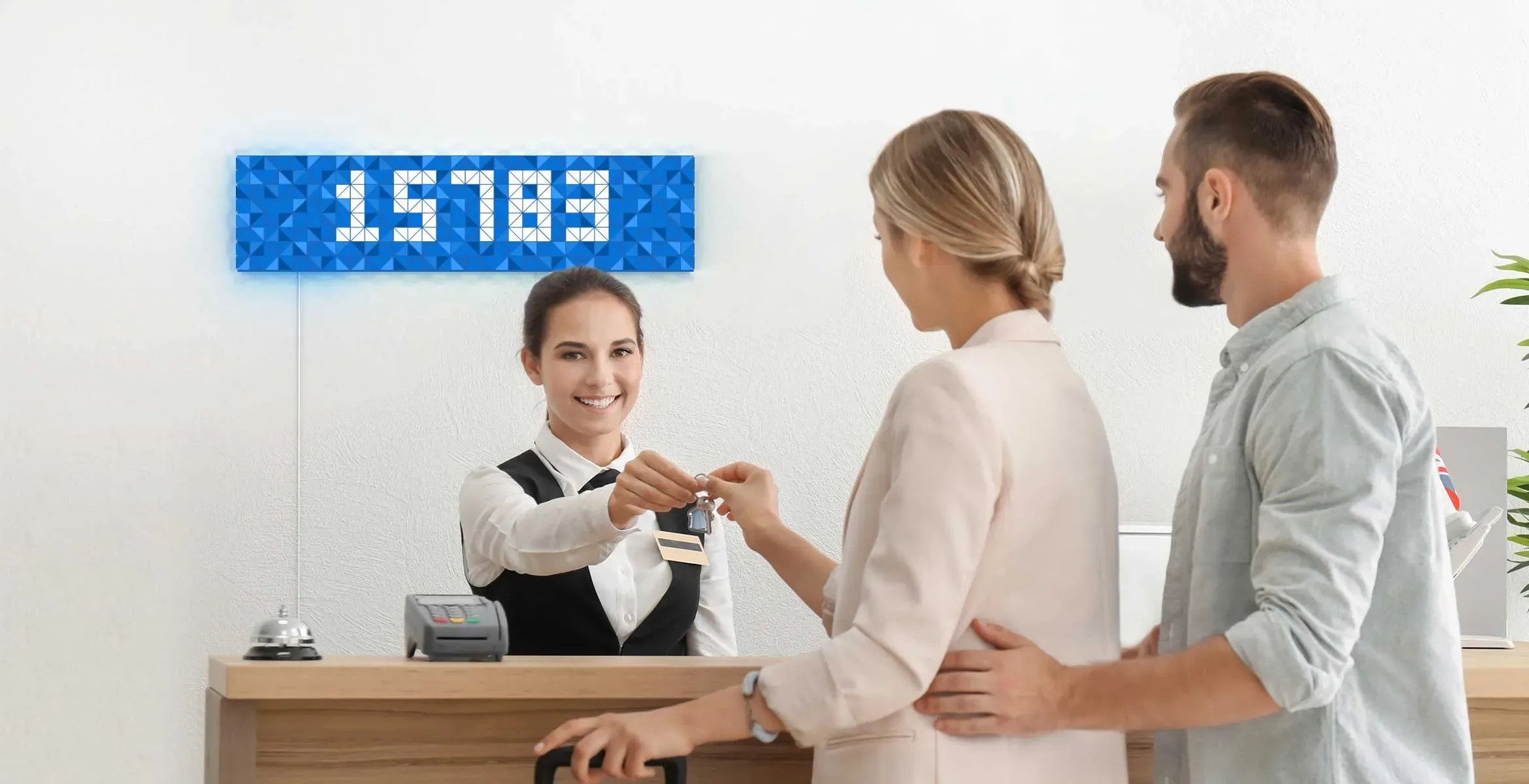 Infoscreen, assembled from 16 smart light surfaces, complements hotel's reception interior and displays Facebook like counter