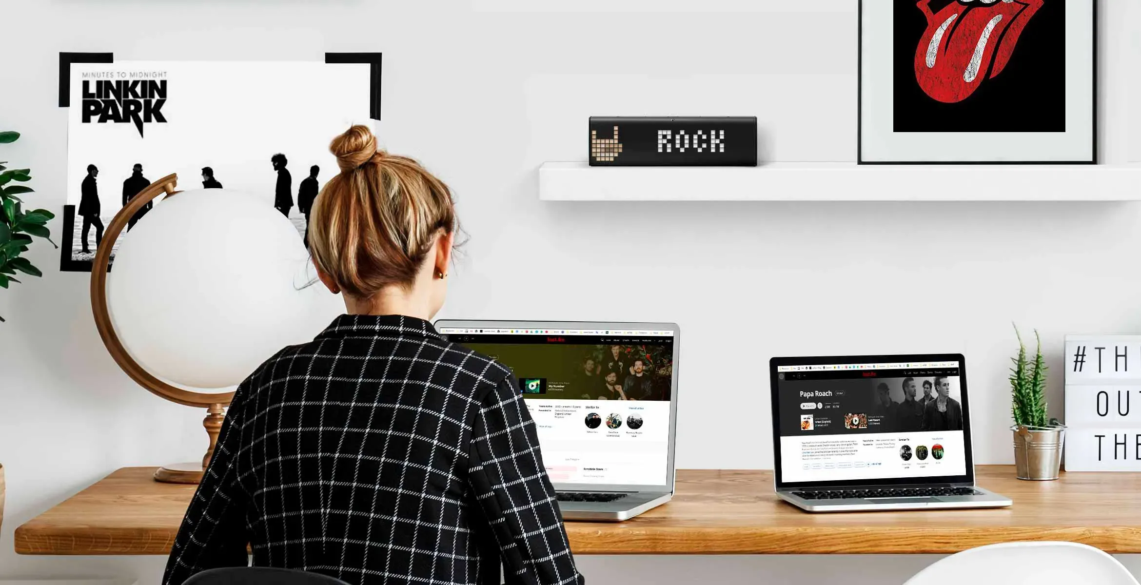 LaMetric Time digital clock stands on a shelf and displays text "Rock"